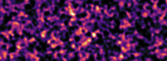 This map of dark matter in the Universe was obtained from data from the KiDS survey, using the VLT Survey Telescope at ESO’s Paranal Observatory in Chile. It reveals an expansive web of dense (light) and empty (dark) regions. This image is one out of five patches of the sky observed by KiDS. Here the invisible dark matter is seen rendered in pink, covering an area of sky around 420 times the size of the full moon. This image reconstruction was made by analysing the light collected from over three million distant galaxies more than 6 billion light-years away. The observed galaxy images were warped by the gravitational pull of dark matter as the light travelled through the Universe. Some small dark regions, with sharp boundaries, appear in this image. They are the locations of bright stars and other nearby objects that get in the way of the observations of more distant galaxies and are hence masked out in these maps as no weak-lensing signal can be measured in these areas.